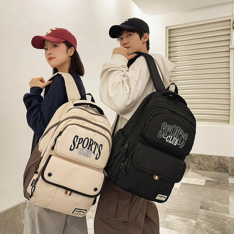 高颜值书包男生初中生高中生超大容量百搭双肩包出差旅游背包女