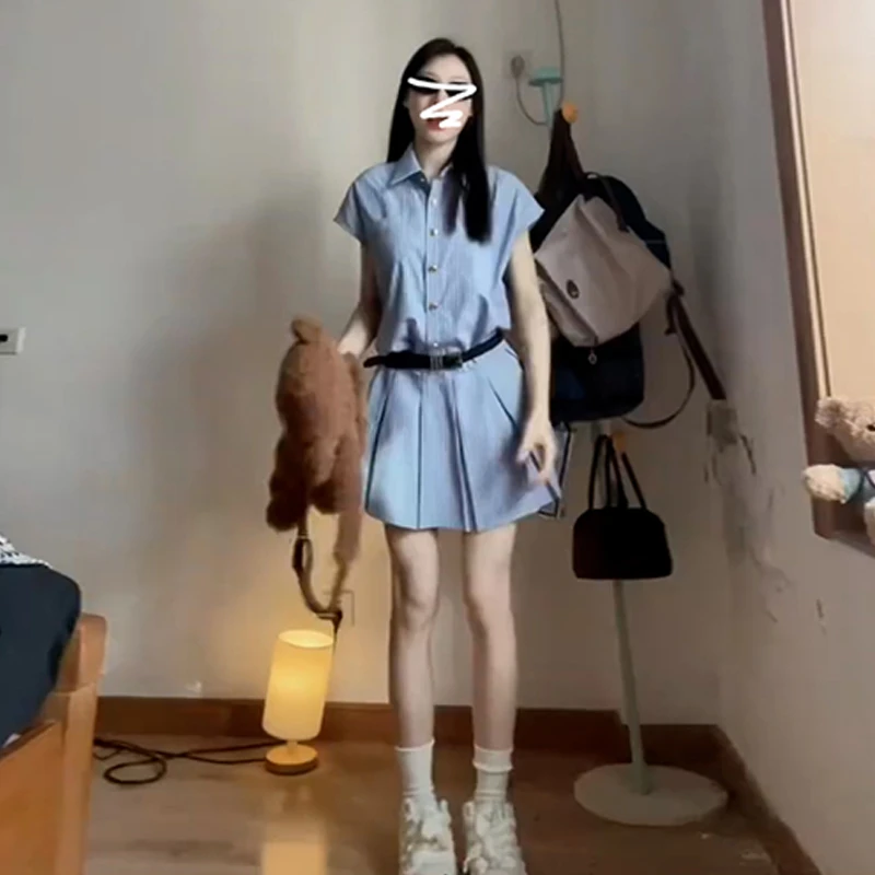 1709学院风蓝色条纹衬衫连衣裙子女夏季2025新款法式收腰百褶短裙