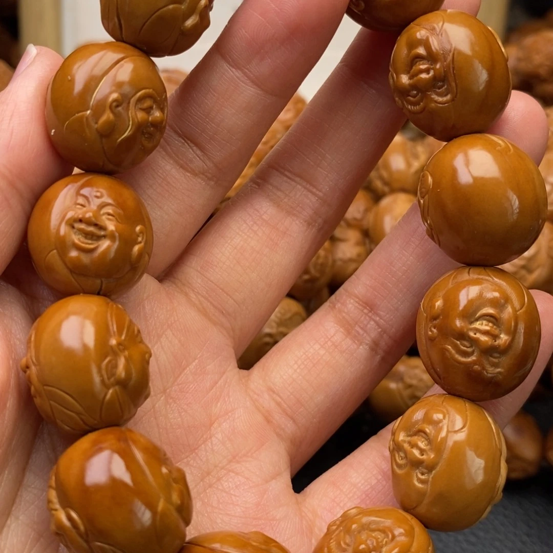 陳***龍橄榄核手串双面财迷