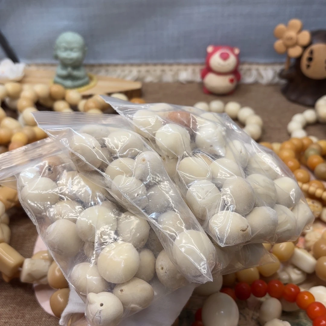 吊坠菩提根/象牙果各种大瑕疵牙果毛坯散珠一包随单
