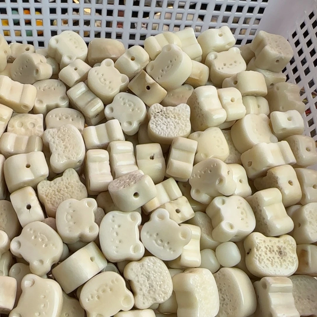 菩提根/象牙果手串瑕疵白色熊头饼10颗