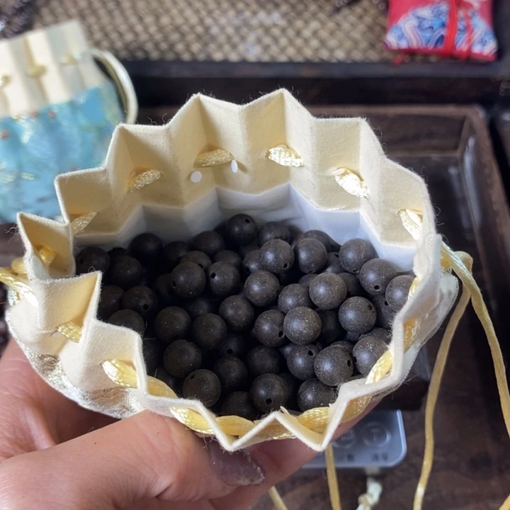 泥塑息肌丸0.8瑕疵珠香包约50克