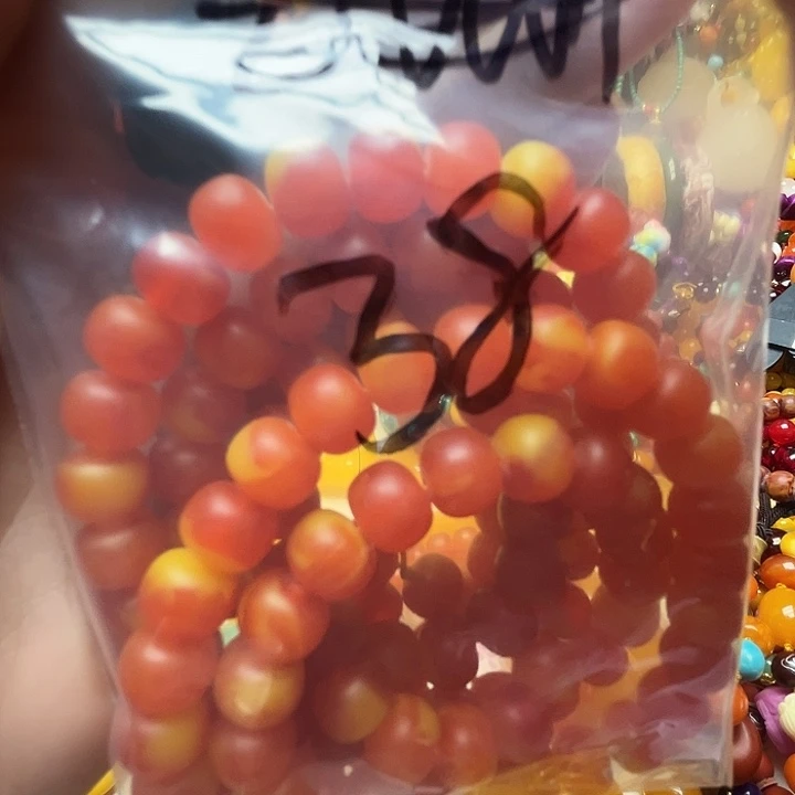 树脂制品花*娘473红皮佛珠