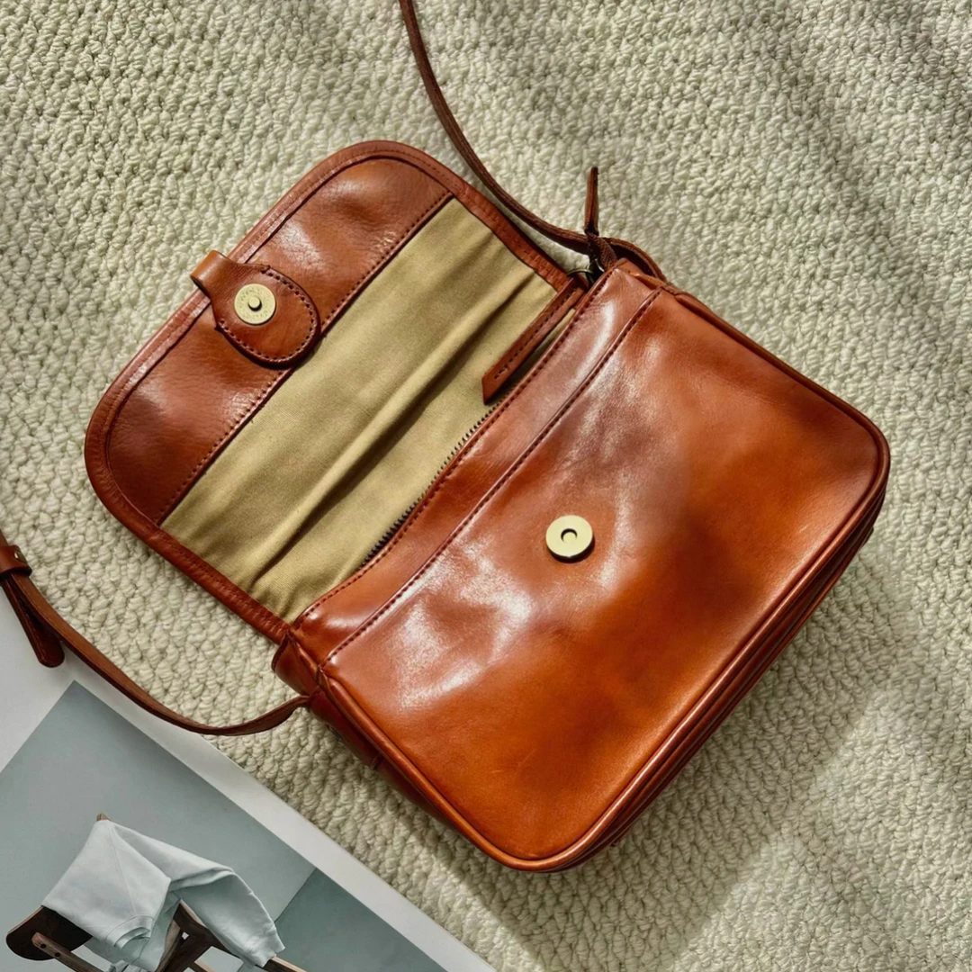 橙子轻奢351-400大容量旅行女包软皮翻盖休闲斜挎包百搭简约