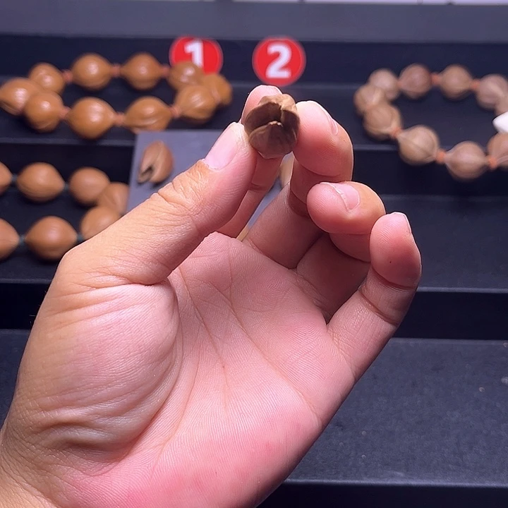 不***来手串橄榄核异形 兰花 单籽