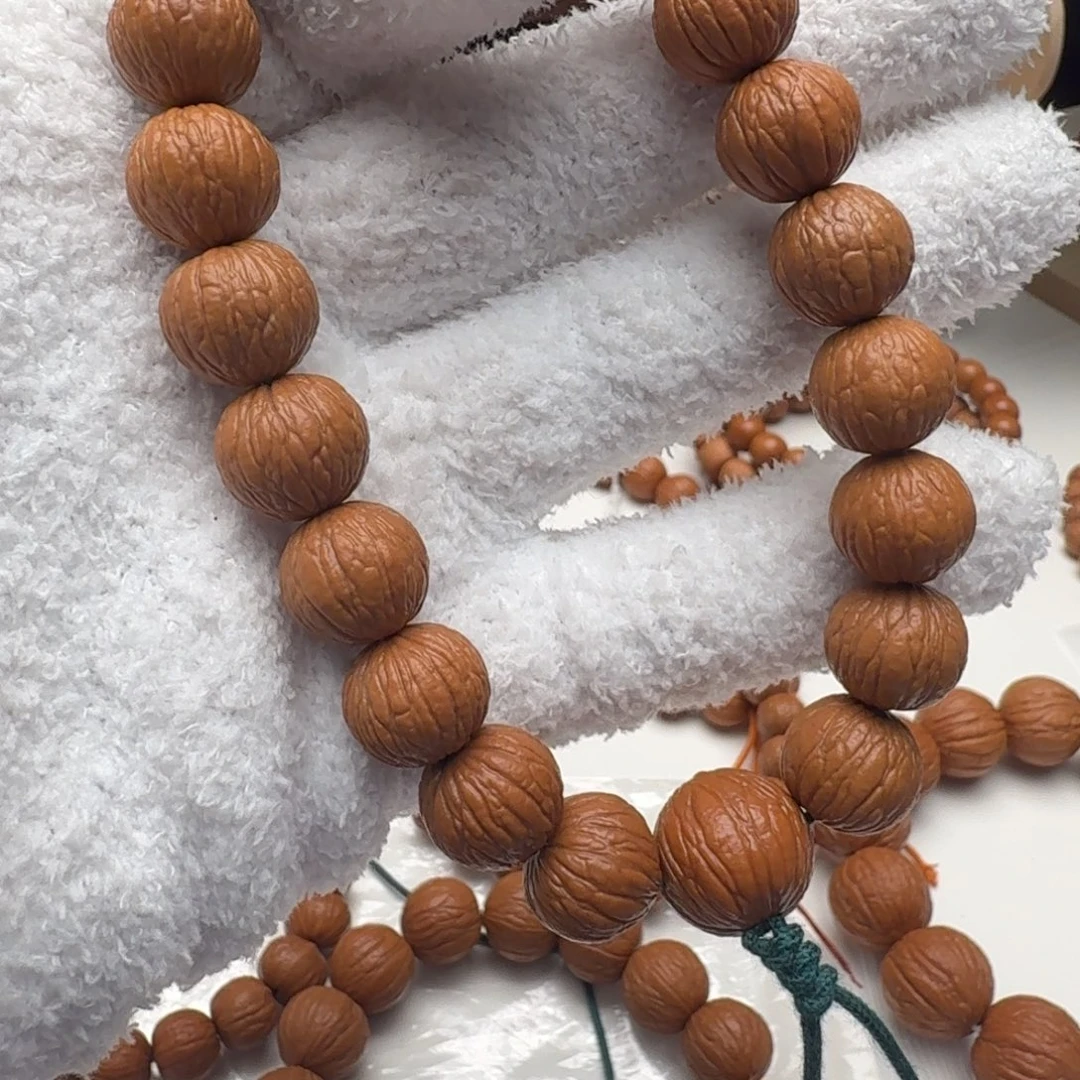 李***.吊坠猴头核桃13大凤羽精卡0.3手持