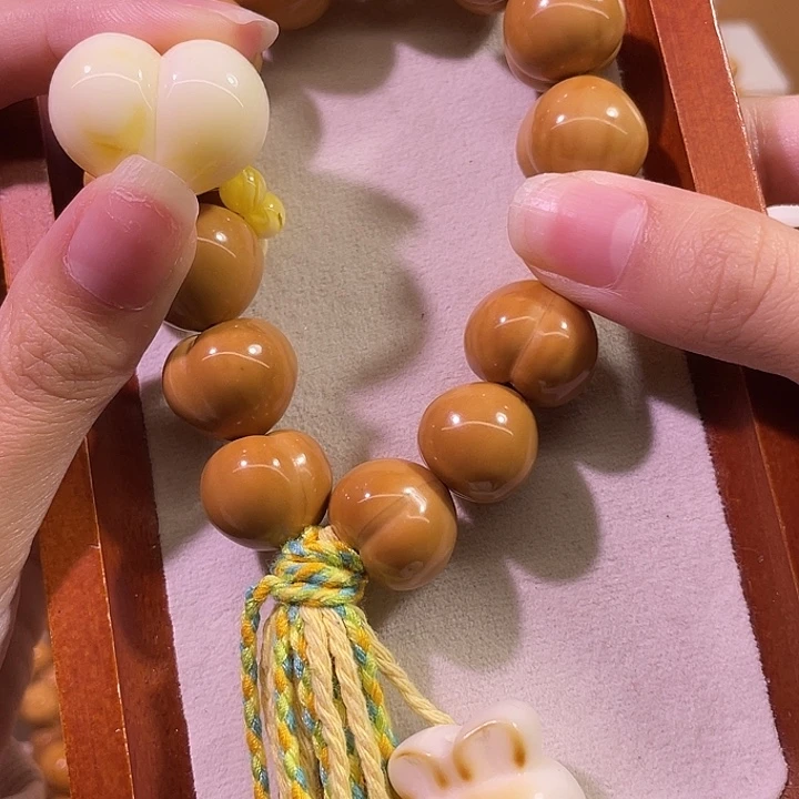 乐***熙猴头核桃吊坠猴头圆屁桃手持设计款