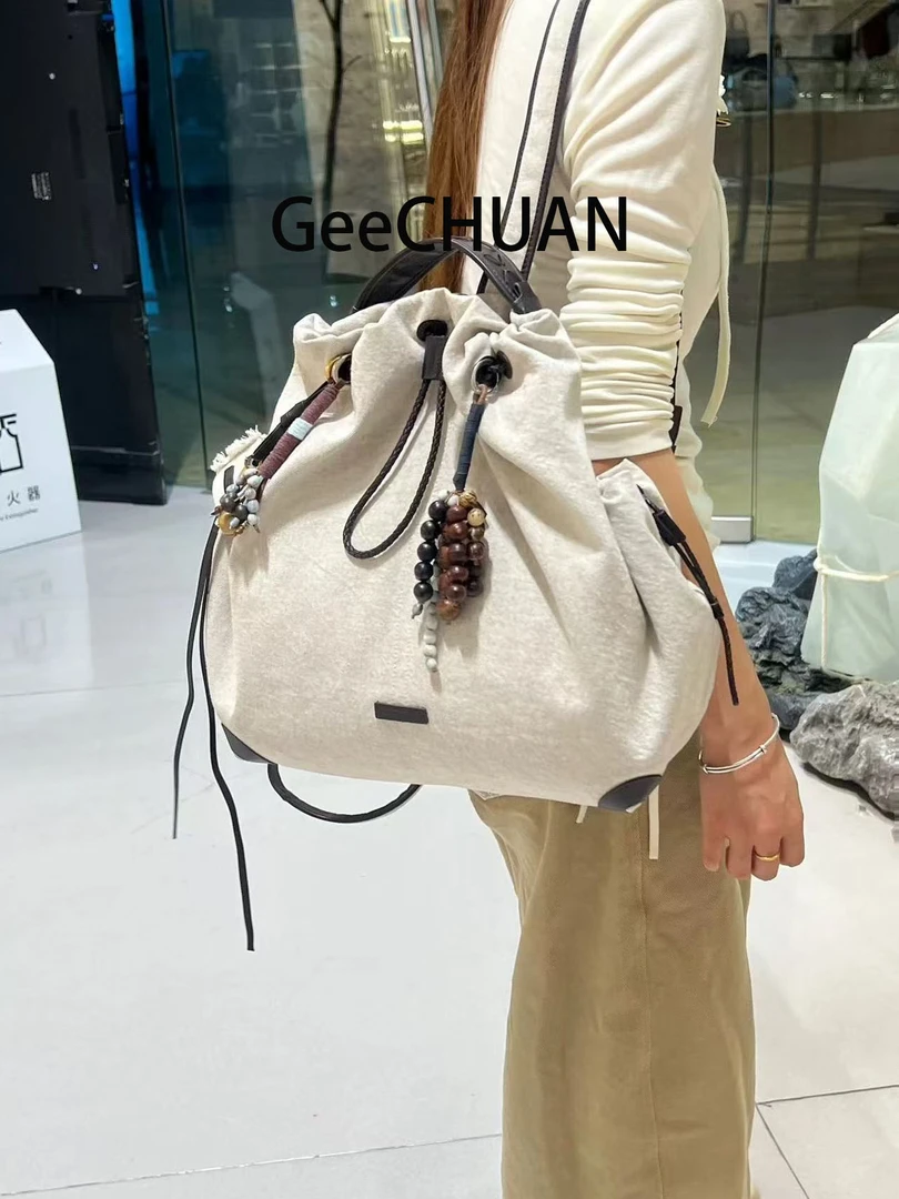 GeeCHUAN孙千同款无性别休闲大容量旅游轻便抽绳帆布包百搭双肩包