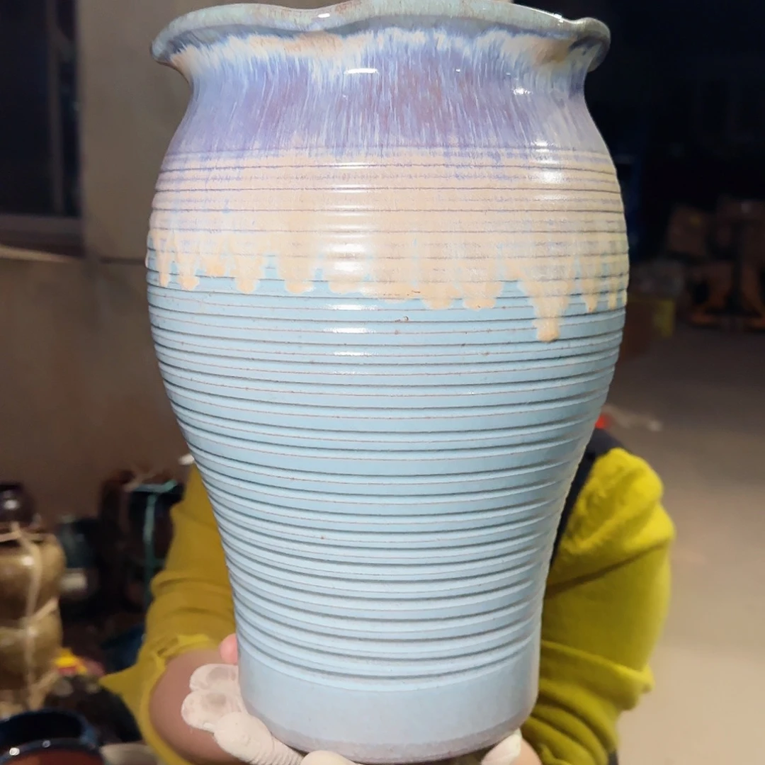 花盆紫砂高30口20。花口