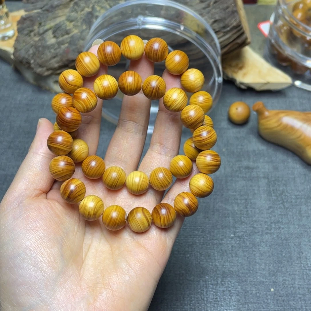 倪***爱柏木（崖柏）1.2黄泥膏2串