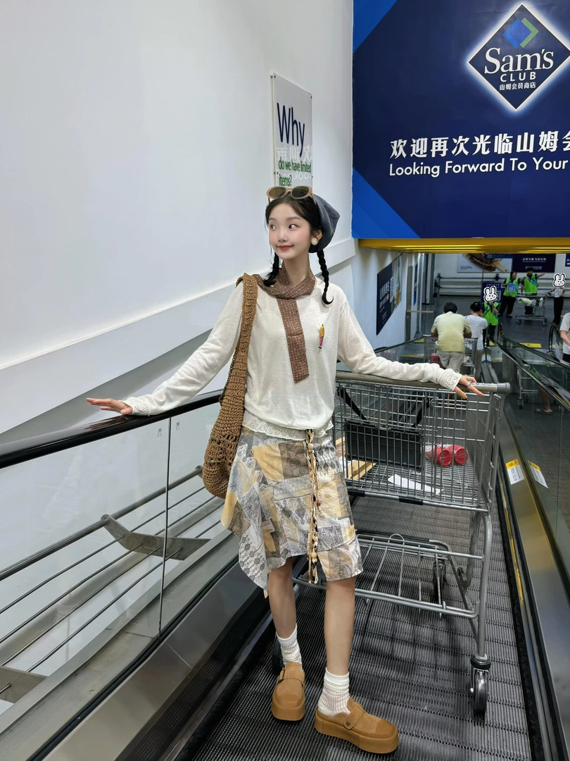 2025秋季新款蕾丝花边拼接圆领长袖针织上衣不规则印花半身裙套装