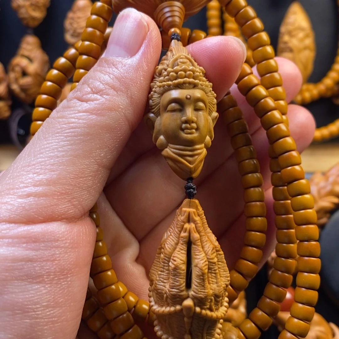 橄榄核手串观音脖挂