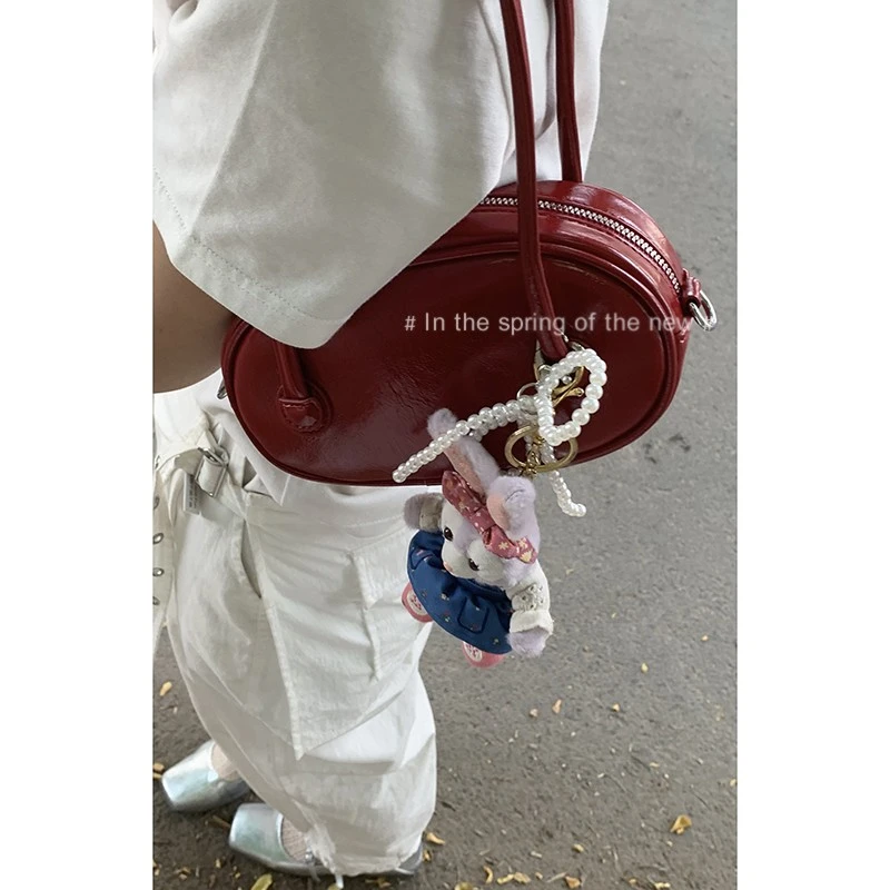 夏天腋下包包女款2025新款高级感小众红色手提包百搭休闲单肩包