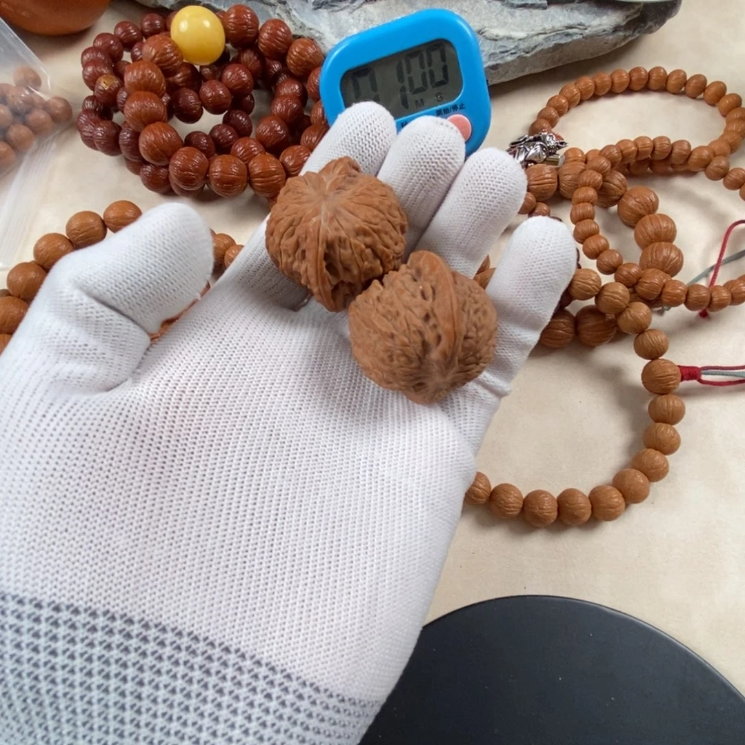 C***g吊坠猴头核桃福袋磨盘