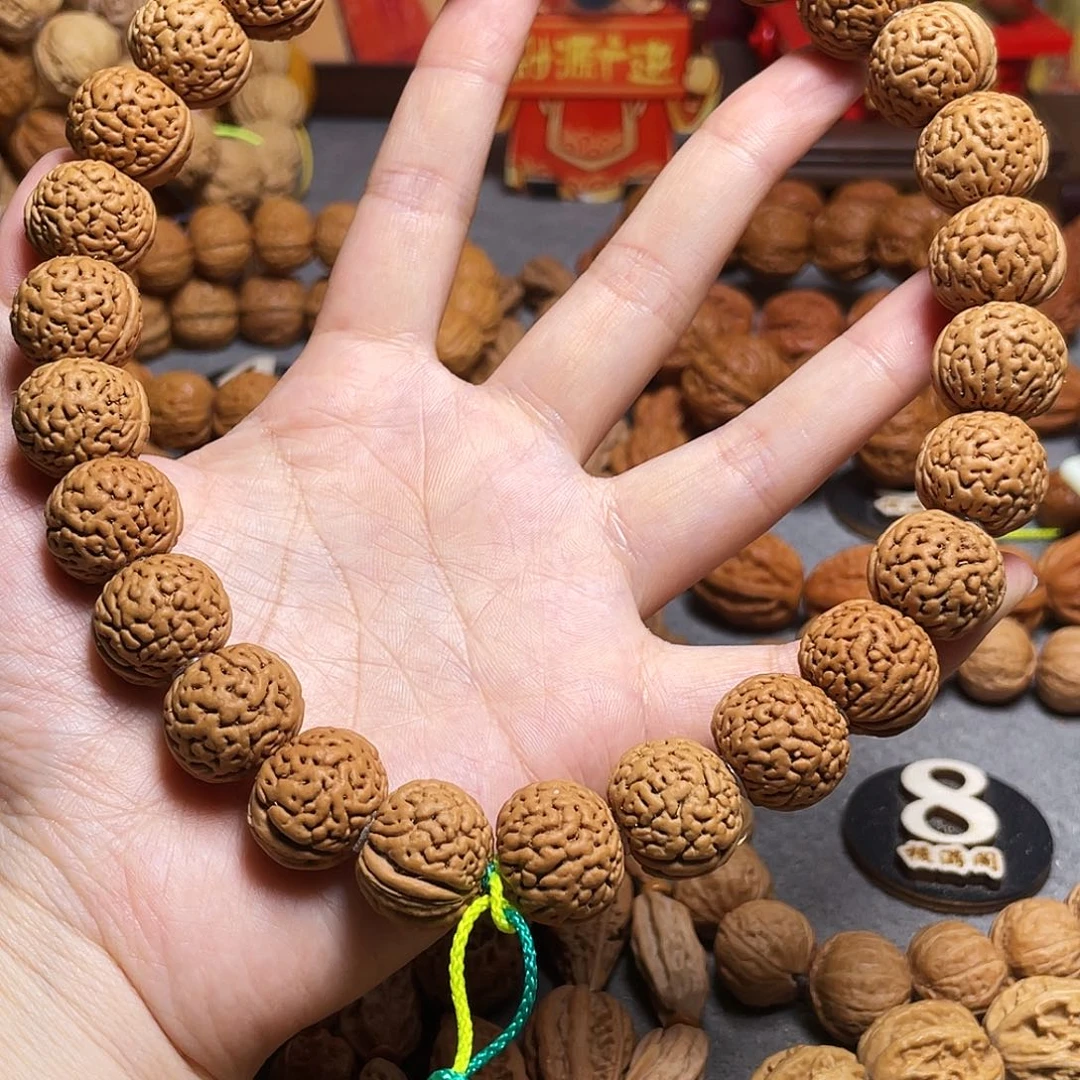 核桃挣**酒桃核密纹手持88
