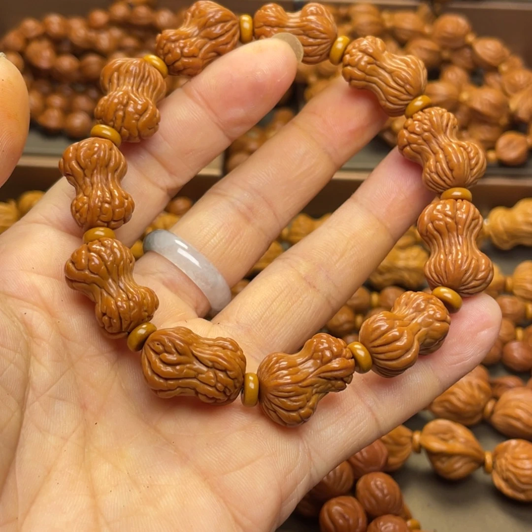 濤***桃核手串龙纹桃核35