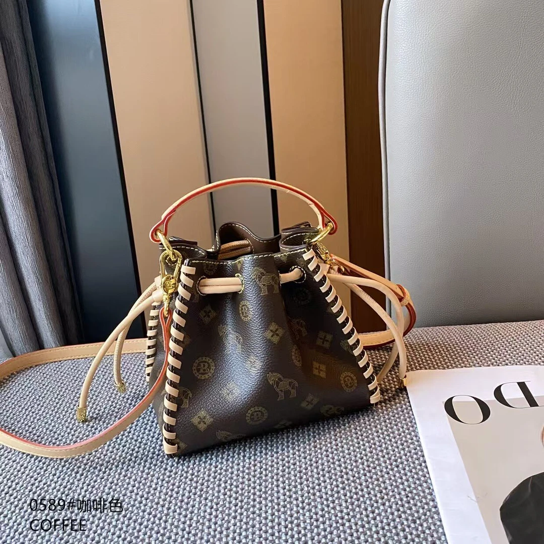 通勤编织束口水桶包包女式2025春夏新款斜挎手提小拎包小福袋0589