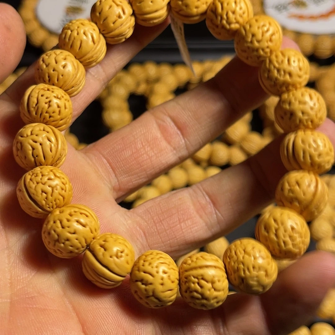 昨***开手串桃核盘锦金豆4号