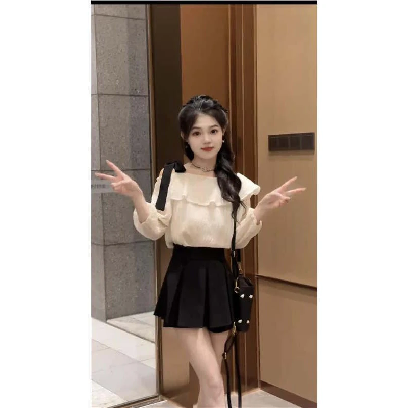 女装法式白色一字肩衬衫女士2025夏季新款设计感炸街独特漂亮小衫