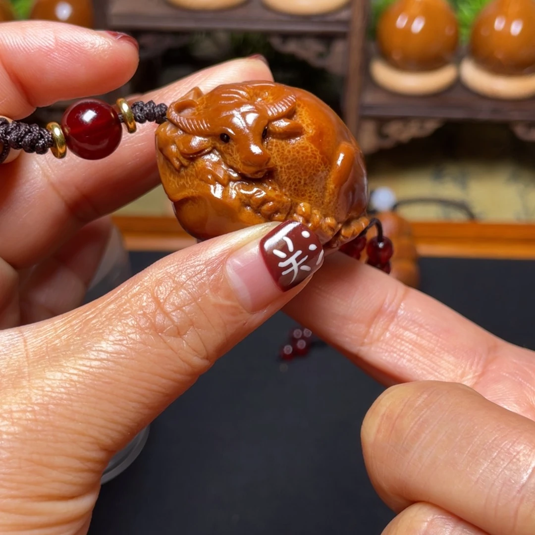 橄榄核吊坠牛掰穿配