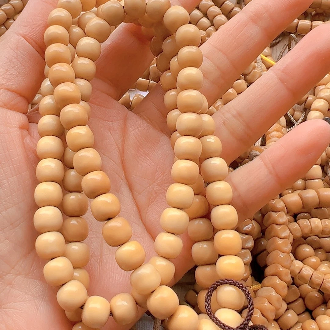 菩提根/象牙果手串一****老卡8老型脖挂两颗带月