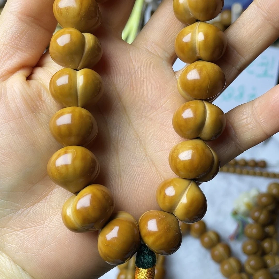 吊坠猴头核桃微瑕屁桃手串