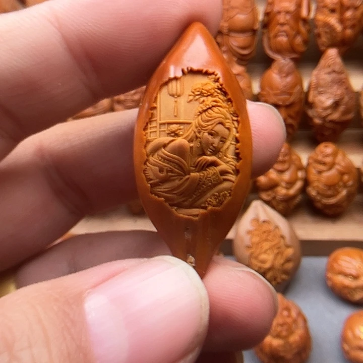 橄榄核吊坠20美女