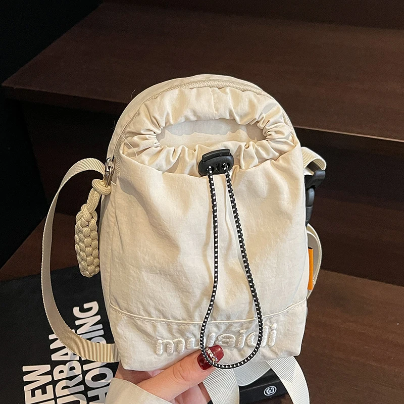 夏季新款日系潮流运动抽绳手机包包轻便通勤户外休闲斜挎女包小包