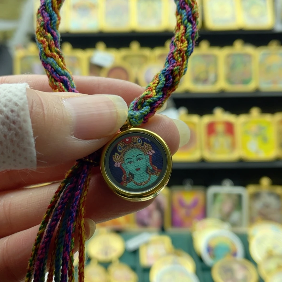 吊坠努****油唐卡等多种形式的艺术