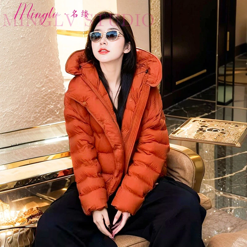 名缕韩系高级感炸街减龄橘红色羽绒服2025年冬季连帽休闲外套女