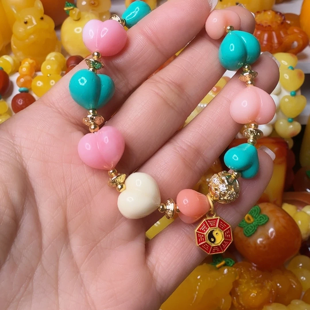 勤***聊非金属屁桃手串一件