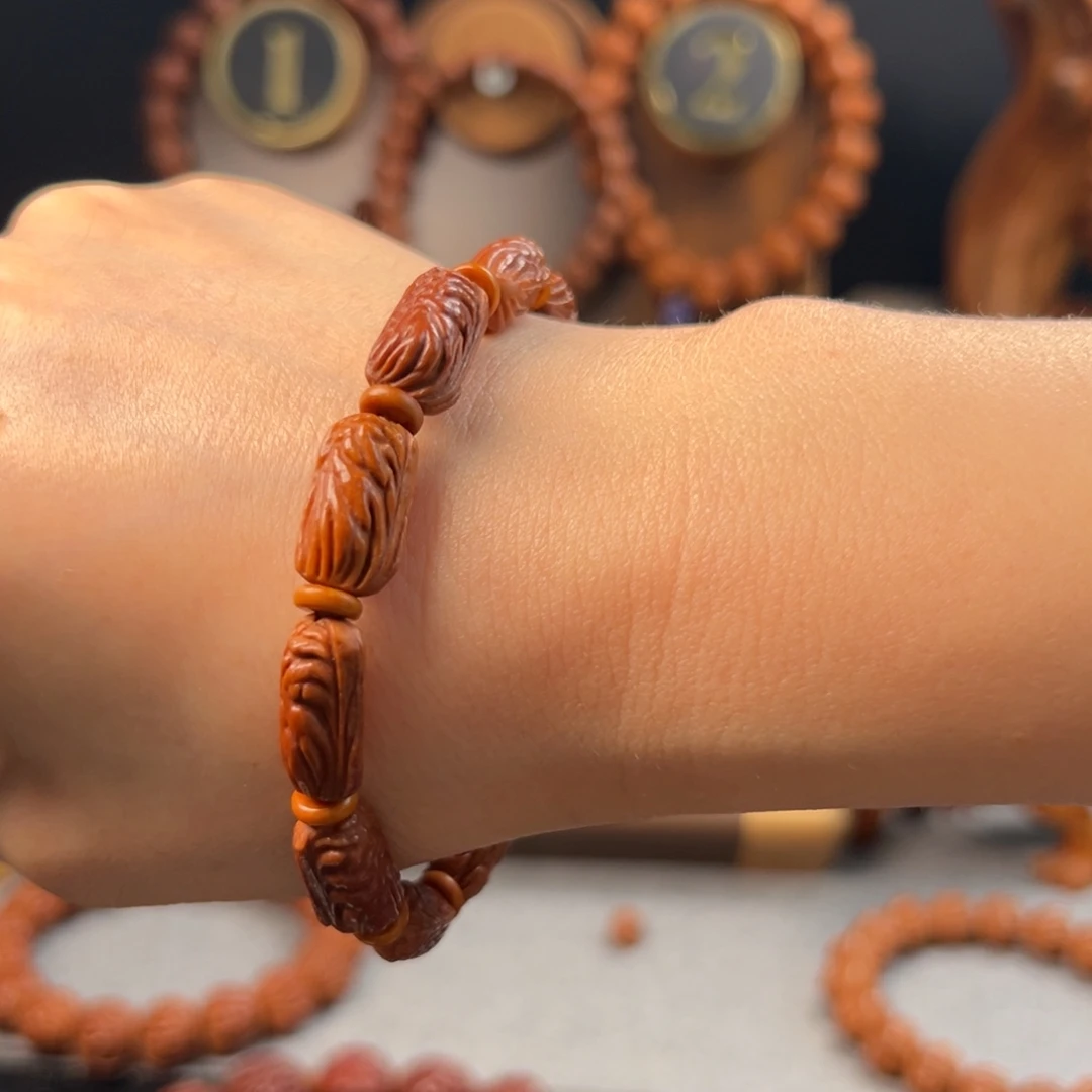 阳***m手串桃核金条单圈