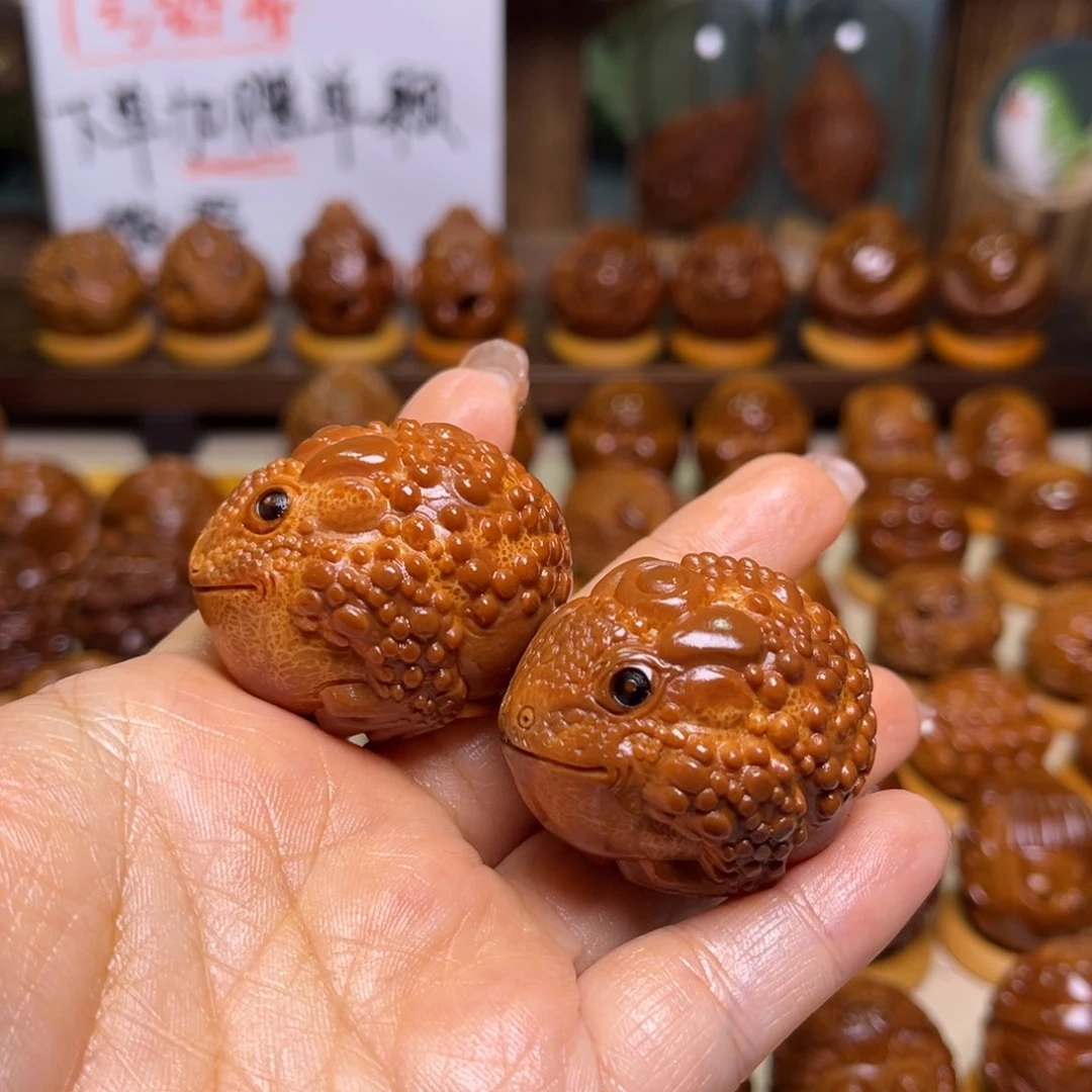 橄榄核把件元宝金蟾一对