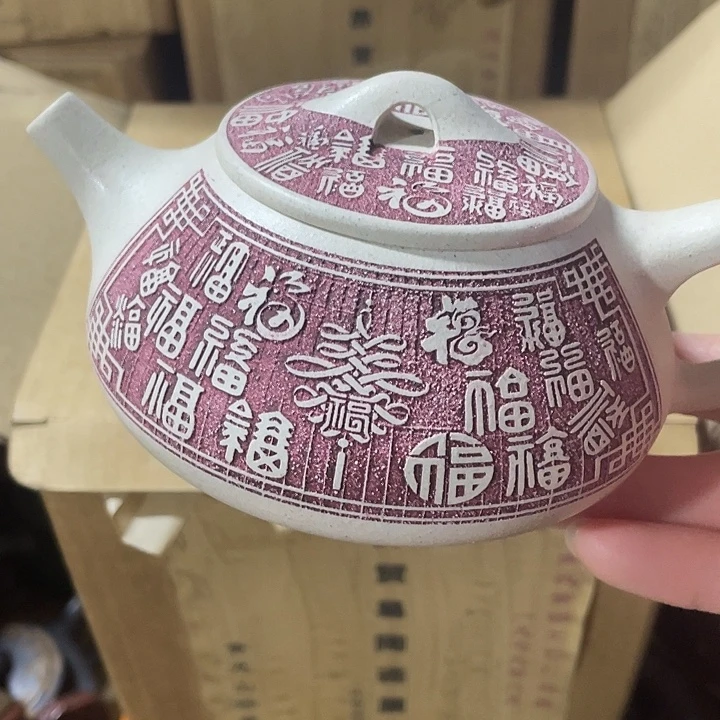 茶壶紫砂手工制作的一把紫砂壶。123