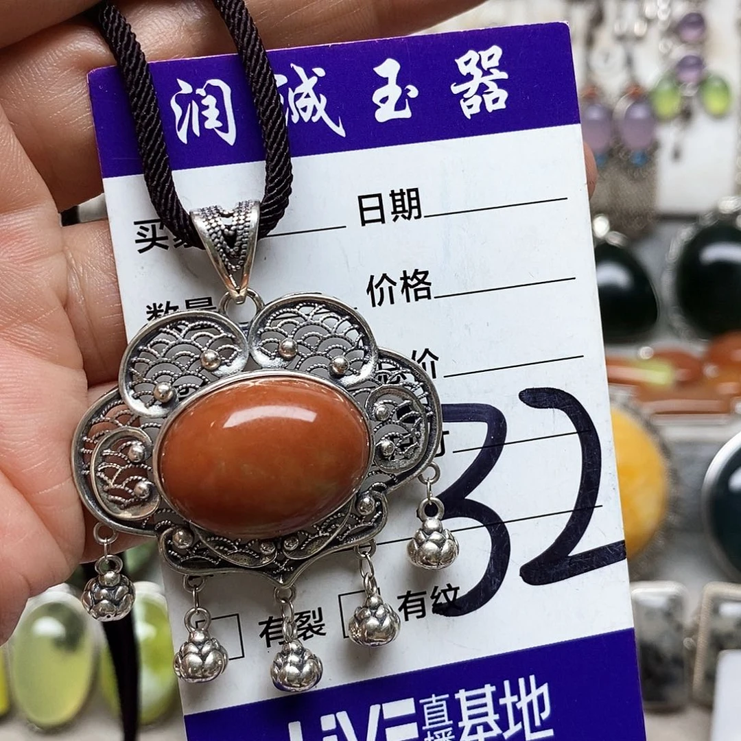 咸****银S925镶嵌蛇纹石玉吊坠
