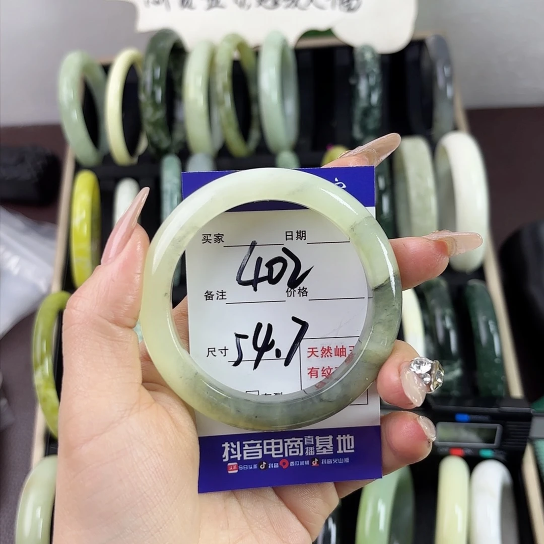 蛇纹石玉手镯未镶嵌棉***糖