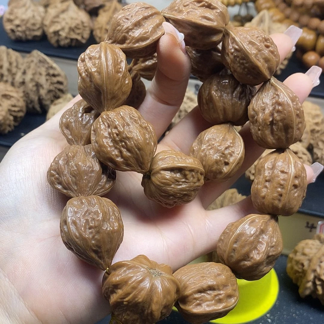 桃核吊坠秦岭鸡心手持18颗