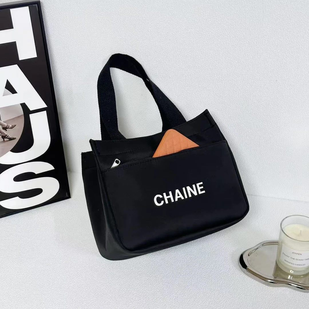 2025新款防水牛津布简约手提包上班族便携零食包便当包外出妈咪包