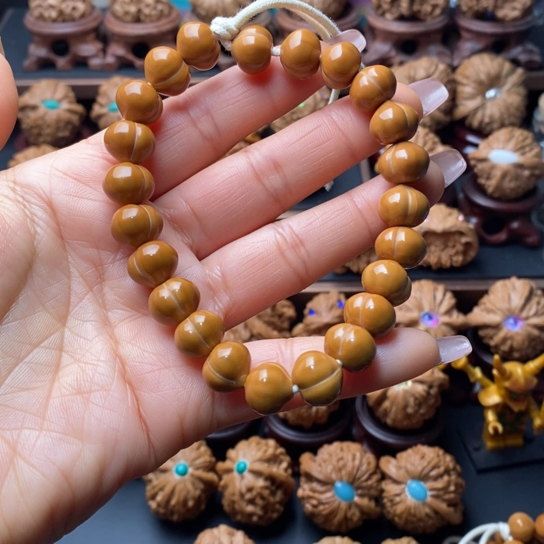 文玩核桃吊坠猴头屁桃