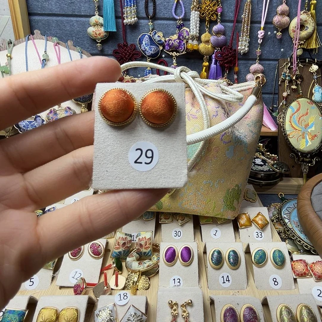 布艺锌合金925银爱马仕橙色圆耳钉一对