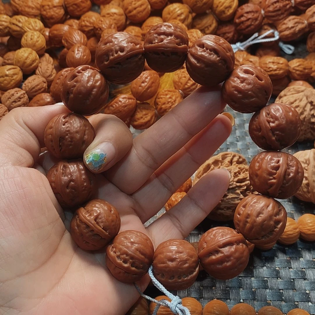 胡***核文玩核桃手串足球