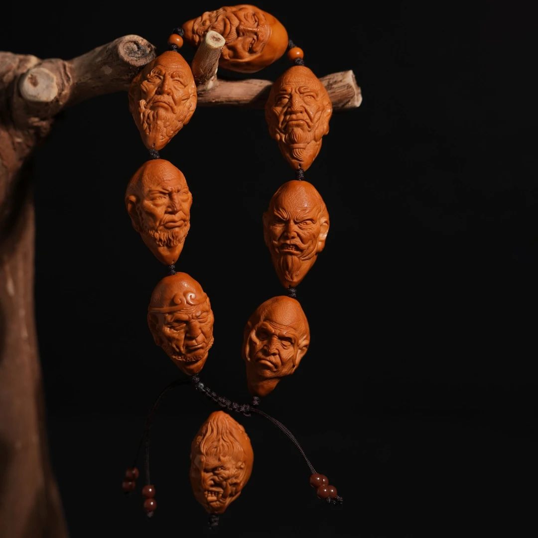 瑾亜，七星罗汉橄榄核雕手串2