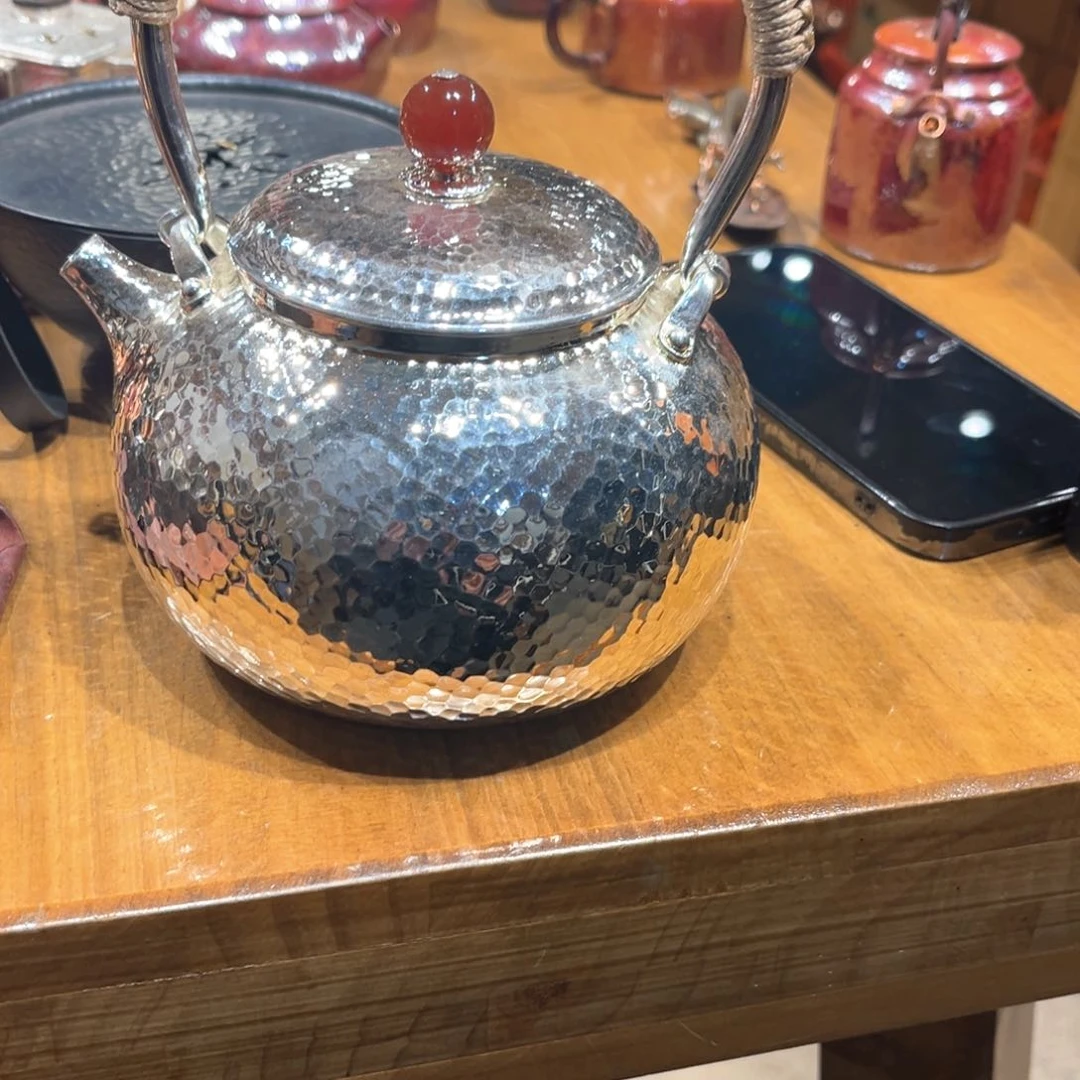 700鎏银壶手工锻打工艺