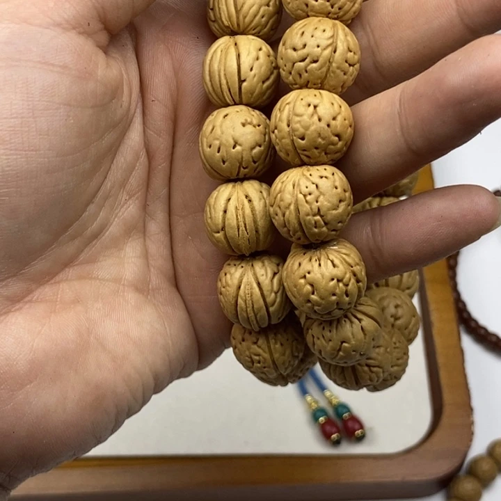 桃核吊坠金丹手串