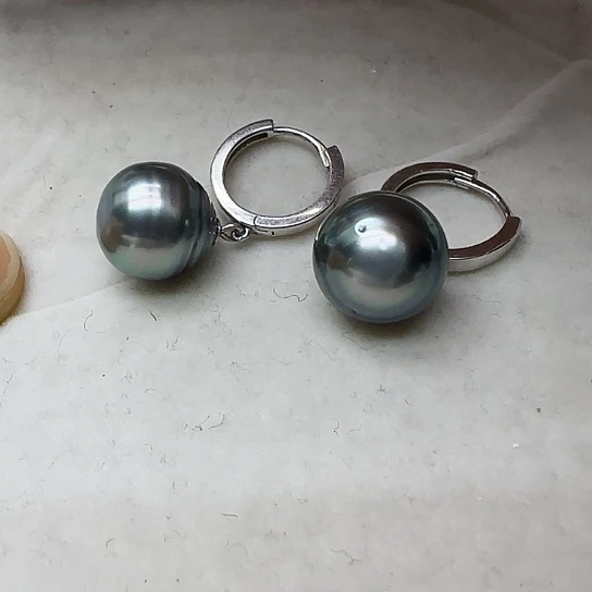 恩***慧海水珍珠银S925镶嵌耳饰