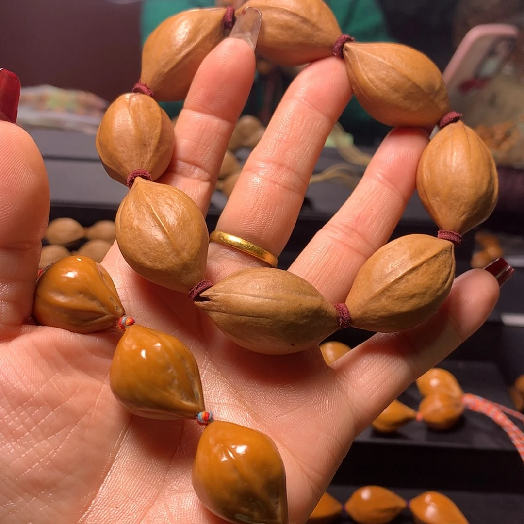 橄榄核手串/手链欧*鹦三花手串