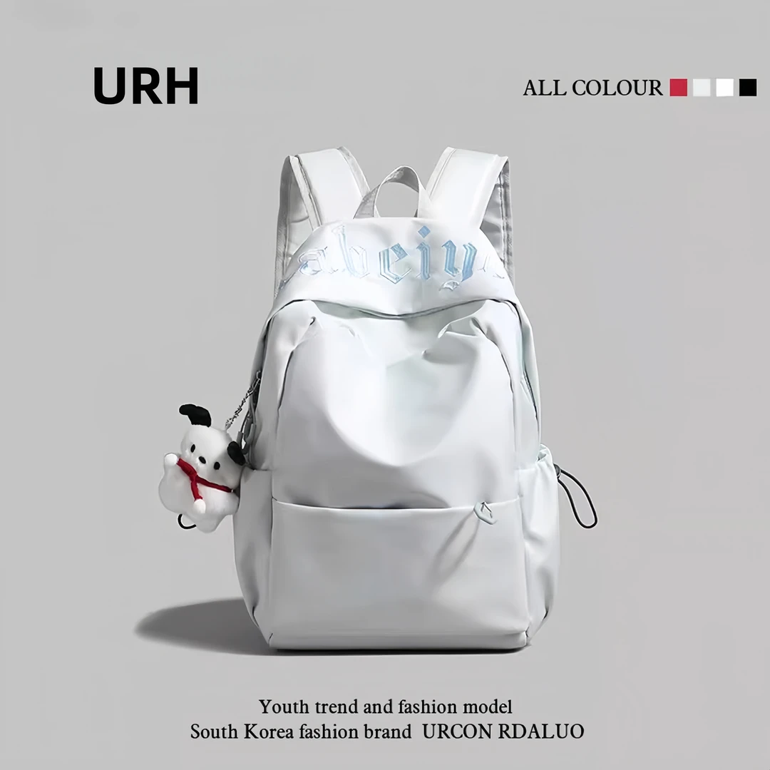 日本简约纯色高中学生初中女生书包2025新款男大容量双肩包背包