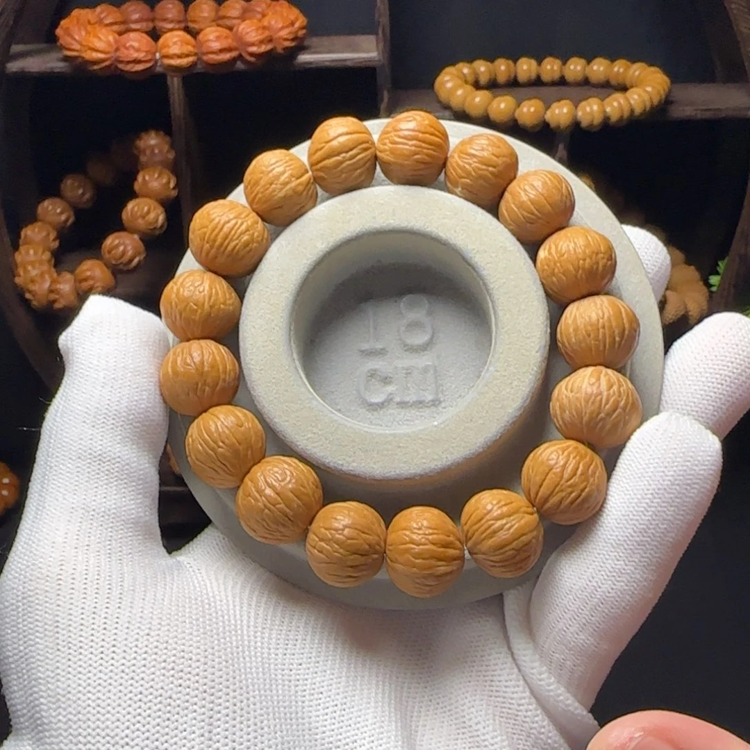 吊坠猴头核桃凤羽