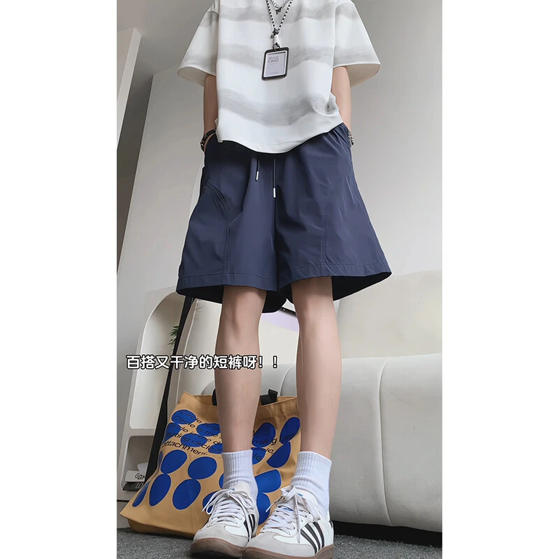 美式斜切休闲短裤男女夏季潮牌拼接宽松薄款速干篮球运动四分裤子