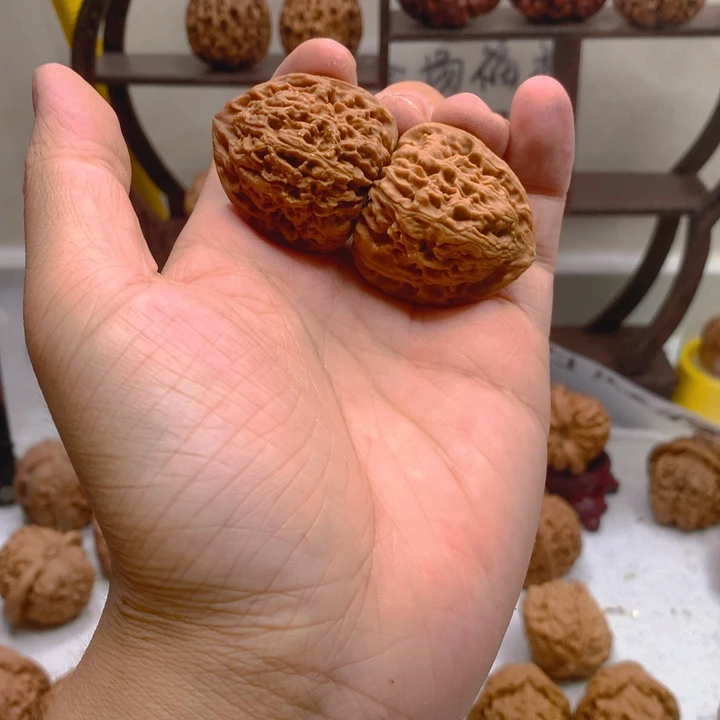 與***象吊坠文玩核桃三角疆